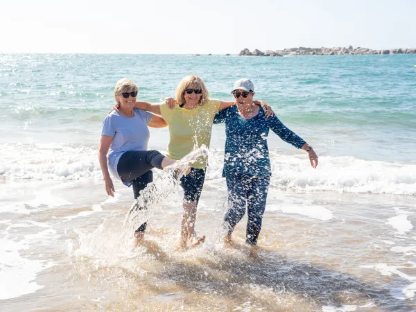 Women Splashing in Water